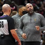 
              Cleveland Cavaliers coach J.B. Bickerstaff, right, talks with referee Jacyn Goble (68) during the first half of the team's NBA basketball game against the Chicago Bulls on Wednesday, Jan. 19, 2022, in Chicago. (AP Photo/Charles Rex Arbogast)
            
