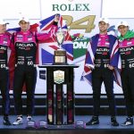 
              Winners of the Rolex 24 hour auto race, from left, Simon Pagenaud, of France, Oliver Jarvis, of Great Britain, Tom Blomqvist, of Monaco and Helio Castroneves, of Brazil celebrate in Victory Lane at Daytona International Speedway, Sunday, Jan. 30, 2022, in Daytona Beach, Fla. (AP Photo/John Raoux)
            