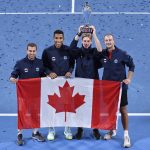 
              Team Canada's pose with their troops as they celebrate their win over Team Spain in the ATP Cup final in Sydney, Australia, Sunday, Jan. 9, 2022. (Dean Lewins/AAP Image via AP)
            