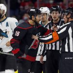 
              Carolina Hurricanes' Vincent Trocheck (16) speaks with an official during the first period of an NHL hockey game against the San Jose Sharks in Raleigh, N.C., Sunday, Jan. 30, 2022. (AP Photo/Karl B DeBlaker)
            