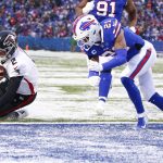 
              Atlanta Falcons quarterback Matt Ryan (2) dives for the end zone in front of Buffalo Bills free safety Jordan Poyer (21) during the second half of an NFL football game Sunday, Jan. 2, 2022, in Orchard Park, N.Y. After review Ryan was ruled down before reaching the end zone. The Bills won 29-15. (AP Photo/Jeffrey T. Barnes)
            