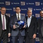 
              FILE - New York Giants new NFL football head coach Joe Judge, second from left, poses for photographs with New York Giants chairman and executive vice president Steve Tisch, second from right, New York Giants CEO John Mara, left, and New York Giants general manager Dave Gettleman, right, after a news conference Thursday, Jan. 9, 2020, in East Rutherford, N.J. Seeing the Giants struggles in a four-win season that led to the retirement of general manager Dave Gettleman and the firing of coach Joe Judge was the low point in co-owner John Mara’s more than 30-year association with the franchise. Speaking less than 24 hours after firing his third coach since December 2017, Mara said Wednesday, Jan. 12, 2022, the Giants need to build from the ground up. (AP Photo/Frank Franklin II, File)
            
