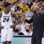 
              Missouri head coach Cuonzo Martin, right, talks to Kobe Brown, left, during a timeout in the second half of an NCAA college basketball game against Texas A&M Saturday, Jan. 15, 2022, in Columbia, Mo. Texas A&M won 67-64. (AP Photo/L.G. Patterson)
            