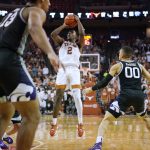 
              Texas guard Marcus Carr (2) shoots against Kansas State during the second half of an NCAA college basketball game Tuesday, Jan. 18, 2022, in Austin, Texas. (AP Photo/Eric Gay)
            