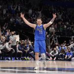 
              Dallas Mavericks guard Luka Doncic (77) reacts to a three-point basket during the second half of an NBA basketball game against the Dallas Mavericks in Dallas, Monday, Jan. 3, 2022. (AP Photo/LM Otero)
            