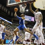 
              Duke forward Wendell Moore Jr. (0) gets past Florida State guard Cam'Ron Fletcher (21) for a shot in the first half of an NCAA college basketball game in Tallahassee, Fla., Tuesday Jan. 18, 2022. (AP Photo/Mark Wallheiser)
            