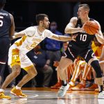 
              South Carolina guard Erik Stevenson (10) looks to pass as Tennessee guard Santiago Vescovi (25) defends during an NCAA college basketball game Tuesday, Jan. 11, 2022, in Knoxville, Tenn. (AP Photo/Wade Payne)
            