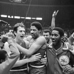 
              FILE - Philadelphia 76ers Bobby Jones, left, embraces Julius Erving after 76ers defeated the Los Angeles Lakers in four straight games to win the NBA Championship, May 31, 1983. (AP Photo, File)
            