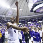 
              TCU center Eddie Lampkin, left, celebrates alongside his teammates after they defeated LSU during an NCAA college basketball game in Fort Worth, Texas, Saturday, Jan. 29, 2022. (AP Photo/Gareth Patterson)
            