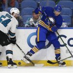 
              San Jose Sharks center Scott Reedy (54) and Buffalo Sabres center Mark Jankowski (17) battle for the puck during the first period of an NHL hockey game, Thursday, Jan. 6, 2022, in Buffalo, N.Y. (AP Photo/Jeffrey T. Barnes)
            