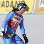 
              Italy's Sofia Goggia reacts in the finish area of an alpine ski, women's World Cup super-G race in Cortina d'Ampezzo, Italy, Sunday, Jan. 23, 2022. (AP Photo/Alessandro Trovati)
            