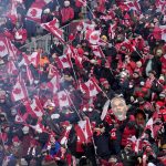 
              Canada fans cheer from the stands prior to World Cup qualifying soccer action between Canada and the United States in Hamilton, Ontario, Sunday, Jan. 30, 2022. (Frank Gunn/The Canadian Press via AP)
            