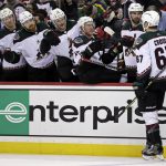
              Arizona Coyotes left wing Lawson Crouse (67) celebrates with teammates after scoring a goal against the New Jersey Devils during the second period of an NHL hockey game Wednesday, Jan. 19, 2022, in Newark, N.J. (AP Photo/Adam Hunger)
            