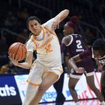 
              Tennessee's Rae Burrell (12) drives to the basket against Texas A&M during an NCAA college basketball game Thursday, Jan. 6, 2022, in Knoxville, Tenn. (Scott Keller/Knoxville News Sentinel via AP)
            