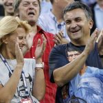 
              FILE - Srdan and Diana Djokovic, patents of Novak Djokovic, react after Novak defeated Roger Federer, of Switzerland, in five sets in a men's semifinal match at the U.S. Open tennis tournament in New York, Sept. 11, 2010. (AP Photo/Mark Humphrey, File)
            