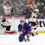 
              New York Islanders center Mathew Barzal (13) reacts after scoring the game winning goal past New Jersey Devils goaltender Jon Gillies in the third period of an NHL hockey game Thursday, Jan. 13, 2022, in Elmont, N.Y. The Islanders won 3-2. (AP Photo/Adam Hunger)
            