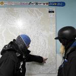 
              Snowmakers Kate Shifani, left, and Ryan Schultz review a snowmaking map at Vail Mountain, Wednesday, Dec. 29, 2021, in Vail, Colo. Newer snowmaking technology is allowing ski areas to be more efficient with energy and water usage as climate change continues to threaten snowpack levels. (AP Photo/Brittany Peterson)
            