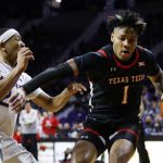 
              Texas Tech guard Terrence Shannon Jr. (1) attempts to get past Kansas State guard Nijel Pack (24) during the first half of an NCAA college basketball game on Saturday, Jan. 15, 2022, in Manhattan, Kan. (AP Photo/Colin E. Braley)
            