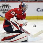 
              Washington Capitals goaltender Zach Fucale (60) watches the puck during the second period of an NHL hockey game against the Boston Bruins, Monday, Jan. 10, 2022, in Washington. (AP Photo/Nick Wass)
            