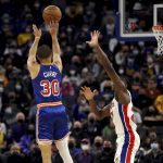 
              Golden State Warriors guard Stephen Curry (30) shoots against Detroit Pistons center Isaiah Stewart (28) during the first half of an NBA basketball game in San Francisco, Tuesday, Jan. 18, 2022. (AP Photo/Jed Jacobsohn)
            