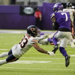 
              Minnesota Vikings cornerback Patrick Peterson (7) intercepts a pass in front of Chicago Bears wide receiver Dazz Newsome (83) during the second half of an NFL football game, Sunday, Jan. 9, 2022, in Minneapolis. Peterson returned the interception 66-yards for a touchdown. (AP Photo/Jim Mone)
            