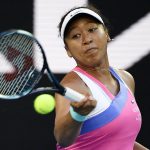 
              Naomi Osaka of Japan plays a forehand return to Madison Brengle of the U.S. during their second round match at the Australian Open tennis championships in Melbourne, Australia, Wednesday, Jan. 19, 2022. (AP Photo/Andy Brownbill)
            