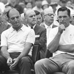 
              FILE - Roberto De Vicenzo, left, sits beside Masters winner Bob Goalby after their match at Augusta National Golf Club in Augusta, Ga., April 14, 1968. Goalby won without a playoff when de Vicenzo signed for the wrong score. Goalby has died. His death Wednesday, Jan. 19, 2022, in his hometown of Belleville, Ill., was confirmed by the PGA Tour and Bill Haas, his great nephew. Goalby was 92. (AP Photo, File)
            