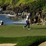 
              Cameron Smith looks towards the gallery after making birdie on the 11th green during the third round of the Tournament of Champions golf event, Saturday, Jan. 8, 2022, at Kapalua Plantation Course in Kapalua, Hawaii. (AP Photo/Matt York)
            