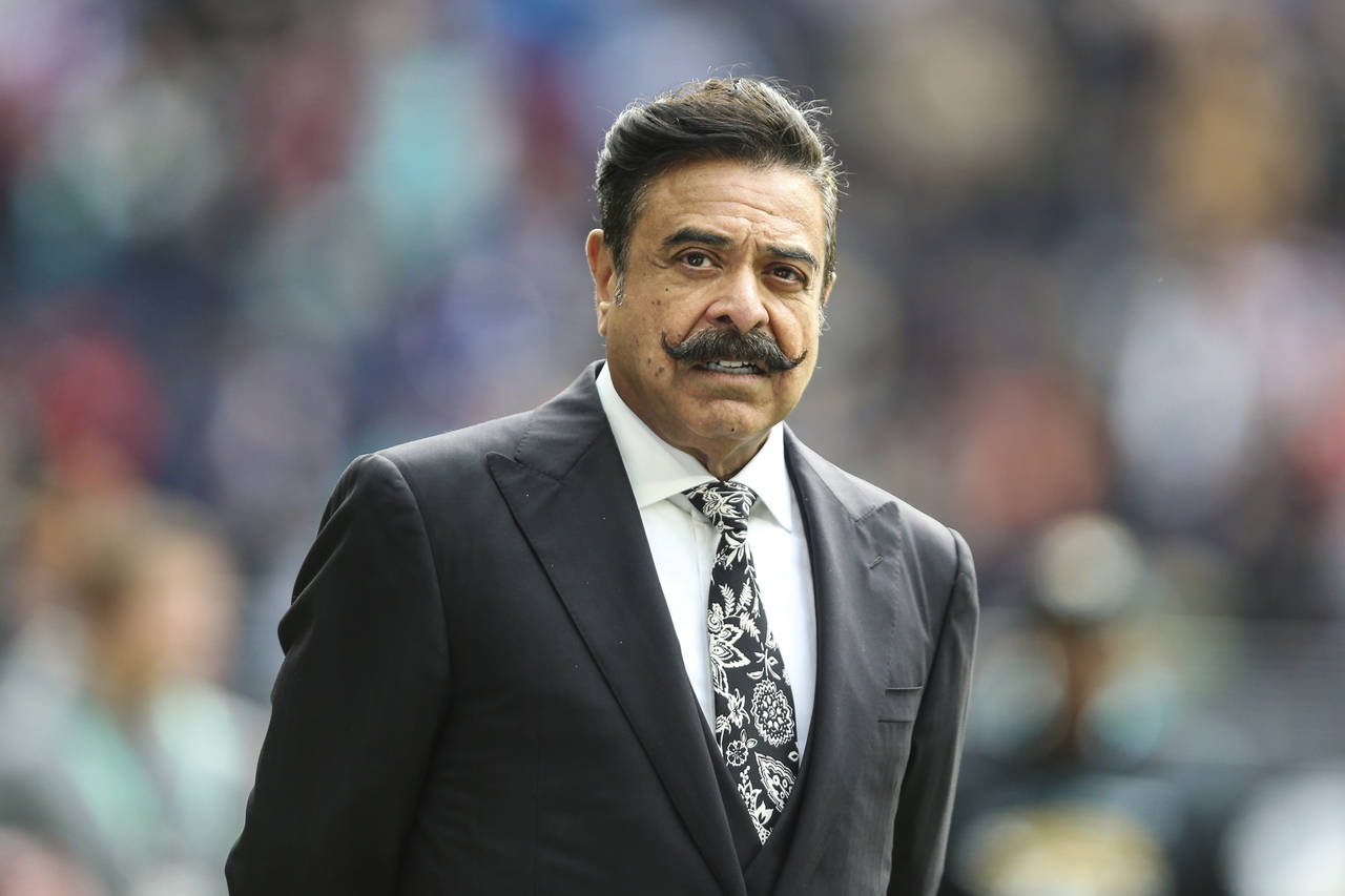 FILE - Jacksonville Jaguars owner Shad Khan is shown on the field before an NFL football game again...