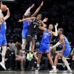 
              Brooklyn Nets forward David Duke Jr. (6) attempts to pass while being defended by Oklahoma City Thunder center Mike Muscala (33), Oklahoma City Thunder forward Luguentz Dort (5), Oklahoma City Thunder forward Darius Bazley (7), and Oklahoma City Thunder guard Shai Gilgeous-Alexander (2) during the first half of an NBA basketball game, Thursday, Jan. 13, 2022, in New York. (AP Photo/Jessie Alcheh)
            