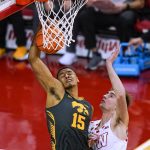 
              Iowa's Keegan Murray (15) grabs a rebound next to Wisconsin's Tyler Wahl during the first half of an NCAA college basketball game Thursday, Jan. 6, 2022, in Madison, Wis. (AP Photo/Andy Manis)
            