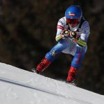
              United States' Mikaela Shiffrin speeds down the course of an alpine ski, women's World Cup super-G race in Cortina d'Ampezzo, Italy, Sunday, Jan. 23, 2022. (AP Photo/Gabriele Facciotti)
            