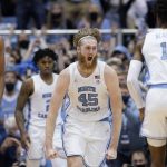 
              North Carolina forward Brady Manek (45) reacts following a basket against Virginia Tech during the second half of an NCAA college basketball game in Chapel Hill, N.C., Monday, Jan. 24, 2022. (AP Photo/Gerry Broome)
            