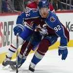 
              Colorado Avalanche left wing Gabriel Landeskog (92) moves the puck against Montreal Canadiens left wing Christian Dvorak (28) during the first period of an NHL hockey game Saturday, Jan. 22, 2022, in Denver. (AP Photo/Jack Dempsey)
            