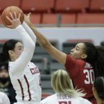 
              Washington State guard Krystal Leger-Walker (4) grabs a rebound against Stanford guard Haley Jones (30) during the first half of an NCAA college basketball game, Sunday, Jan. 2, 2022, in Pullman, Wash. (AP Photo/Young Kwak)
            