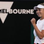 
              Amanda Anisimova of the U.S. celebrates after defeating Belinda Bencic of Switzerland in their second round match at the Australian Open tennis championships in Melbourne, Australia, Wednesday, Jan. 19, 2022. (AP Photo/Simon Baker)
            