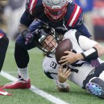 
              Jacksonville Jaguars quarterback Trevor Lawrence (16) hits the turf after a sack by New England Patriots outside linebacker Dont'a Hightower, top, during the first half of an NFL football game, Sunday, Jan. 2, 2022, in Foxborough, Mass. (AP Photo/Steven Senne)
            