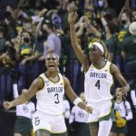 
              Baylor guard Jordan Lewis, left, reacts to her three point shot with teammate Queen Egbo, right, in the first half of an NCAA college basketball game against Iowa State, Sunday, Jan. 23, 2022, in Waco, Texas. (Rod Aydelotte/Waco Tribune-Herald via AP)
            