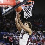 
              Gonzaga forward Anton Watson shoots during the first half of the team's NCAA college basketball game against San Francisco, Thursday, Jan. 20, 2022, in Spokane, Wash. (AP Photo/Young Kwak)
            