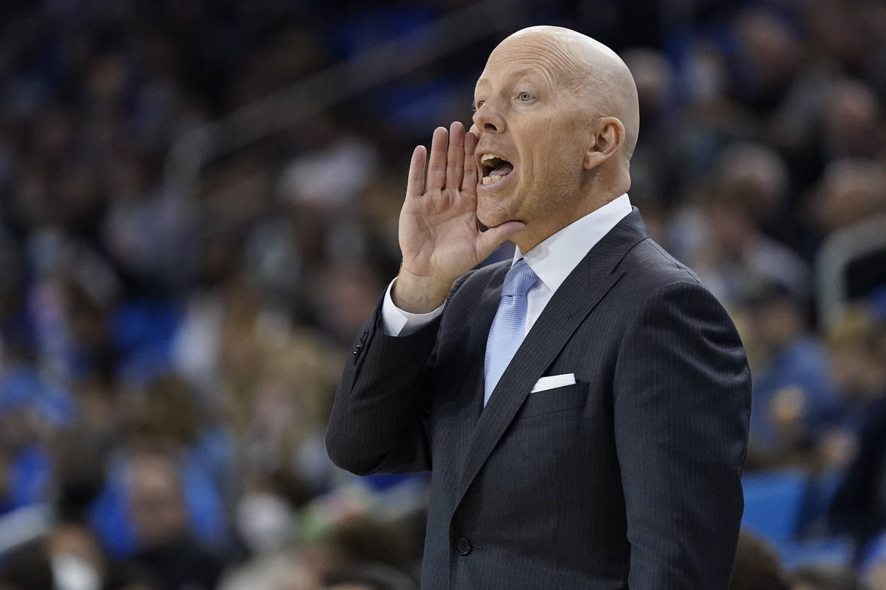 FILE - UCLA head coach Mick Cronin yells from the sideline during the first half of an NCAA college...