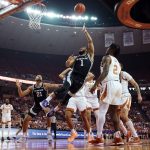 
              Kansas State guard Markquis Nowell (1) drives to the basket against Texas during the first half of an NCAA college basketball game Tuesday, Jan. 18, 2022, in Austin, Texas. (AP Photo/Eric Gay)
            