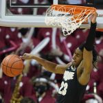 
              Purdue's Jaden Ivey dunks during the second half of an NCAA college basketball game against Indiana, Thursday, Jan. 20, 2022, in Bloomington, Ind. (AP Photo/Darron Cummings)
            