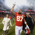 
              Kansas City Chiefs tight end Travis Kelce (87) walks off the field after an NFL divisional round playoff football game against the Buffalo Bills, Sunday, Jan. 23, 2022, in Kansas City, Mo. The Chiefs won 42-36 in overtime. (AP Photo/Colin E. Braley)
            