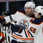 
              Edmonton Oilers' Leon Draisaitl (29) celebrates his goal against the Toronto Maple Leafs with teammate Kailer Yamamoto (56) during the first period of an NHL hockey game, Wednesday, Jan. 5, 2022 in Toronto. (Frank Gunn/The Canadian Press via AP)
            