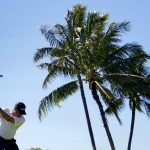 
              Ryan Palmer plays his shot from the 17th tee during the first round of the Sony Open golf tournament, Thursday, Jan. 13, 2022, at Waialae Country Club in Honolulu. (AP Photo/Matt York)
            