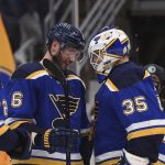 
              St. Louis Blues defenseman Marco Scandella (6) and goaltender Ville Husso (35) celebrate the team's win over the Washington Capitals in an NHL hockey game on Friday, Jan. 7, 2022, in St. Louis. (AP Photo/Joe Puetz)
            