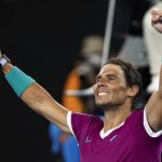
              Rafael Nadal of Spain celebrates after defeating Matteo Berrettini of Italy in their semifinal match at the Australian Open tennis championships in Melbourne, Australia, Friday, Jan. 28, 2022. (AP Photo/Hamish Blair)
            