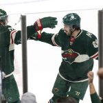 
              Minnesota Wild center Frederick Gaudreau (89) celebrates his winning goal against the Washington Capitals with left wing Marcus Foligno (17) during a shootout of an NHL hockey game Saturday, Jan. 8, 2022, in St, Paul, Minn. (AP Photo/Andy Clayton-King)
            