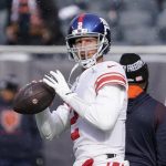 
              New York Giants quarterback Mike Glennon warms up before an NFL football game against the Chicago Bears Sunday, Jan. 2, 2022, in Chicago. (AP Photo/Nam Y. Huh)
            