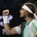 
              Stefanos Tsitsipas of Greece reacts after winning a point against Jannik Sinner of Italy during their quarterfinal the Australian Open tennis championships in Melbourne, Australia, Wednesday, Jan. 26, 2022. (AP Photo/Andy Brownbill)
            